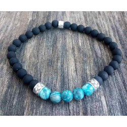 Pulsera cerámica negra perlas azul turquesas